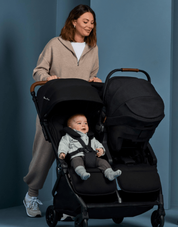 Woman pushing Silvercross Jet 5 Double Stroller