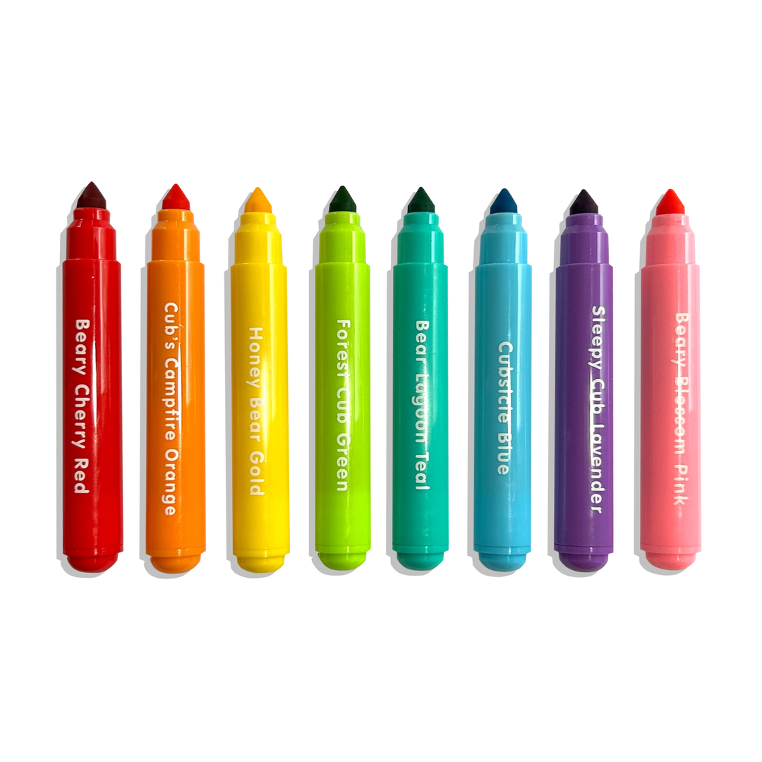 Set of colorful markers with names on a white background