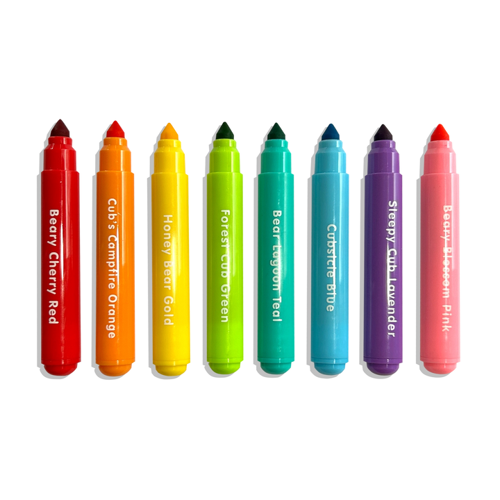 Set of colorful markers with names on a white background