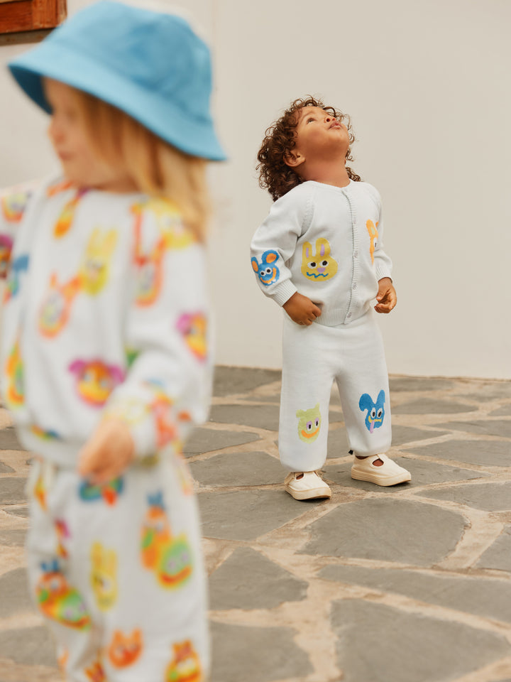 Child wearing Sol Wave Crest Knit Pants by Molo