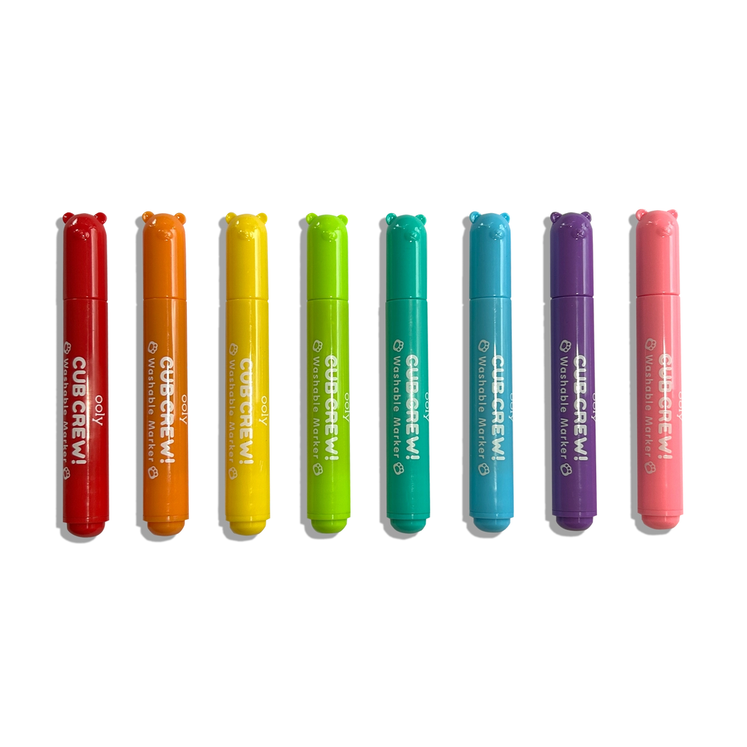 Set of eight colorful markers with 'Cub Crew!' branding on a white background