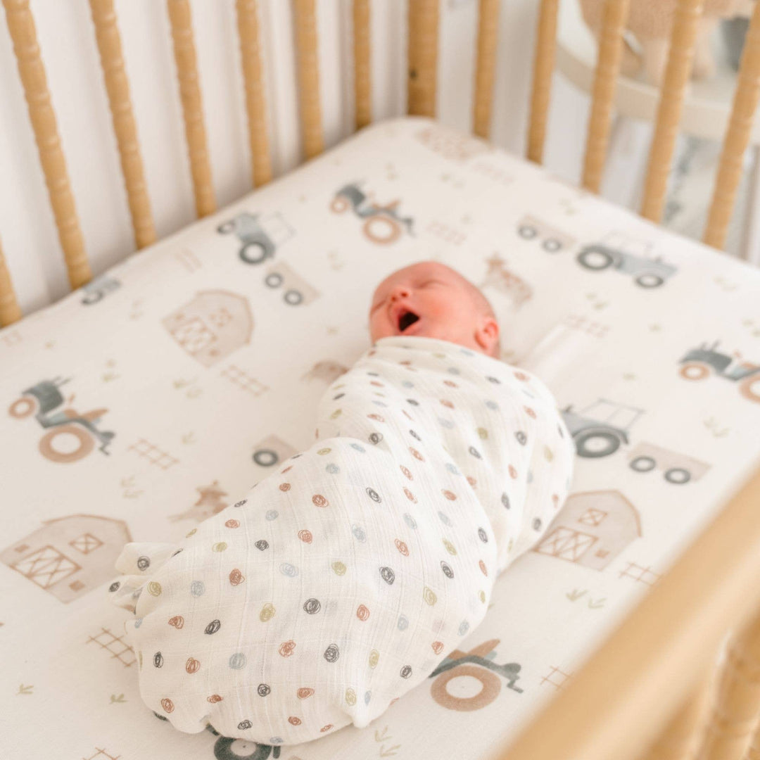 Babesta Charlie Farmhouse Tractor Crib Sheet by Crane Baby
