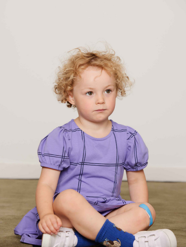  girl wearing Check AOP Dress by Mini Rodini 