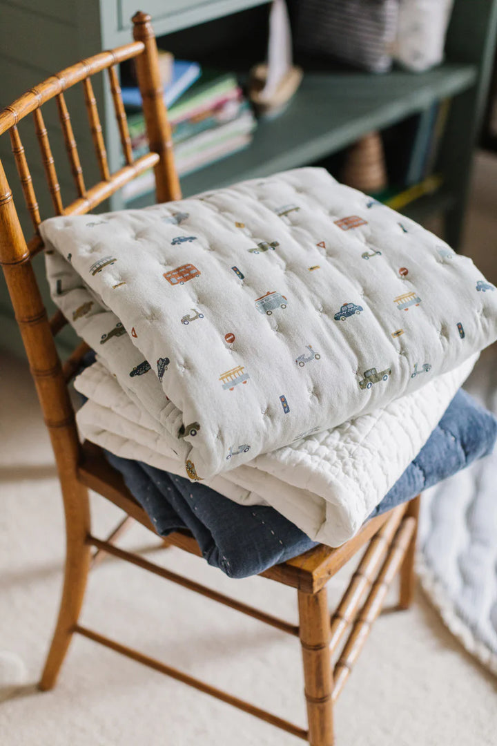Babesta Rush Hour Quilted Chambray Blankets by Pehr