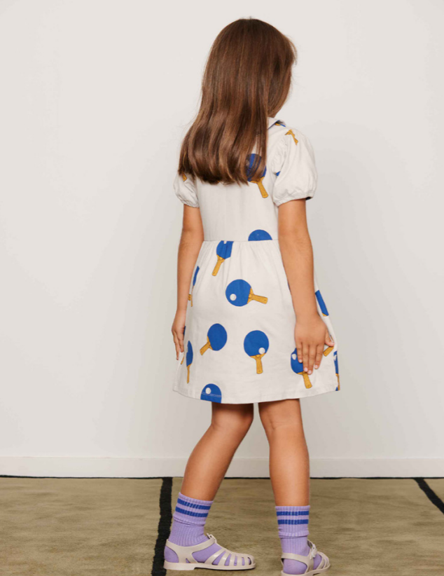 girl wearing Table Tennis AOP SS Dress by Mini Rodini