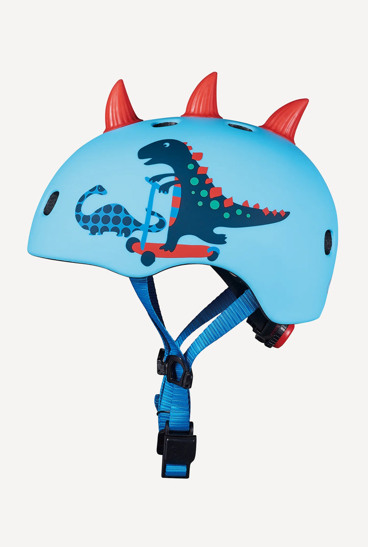 Blue children's helmet with dinosaur design and red spikes on a white background