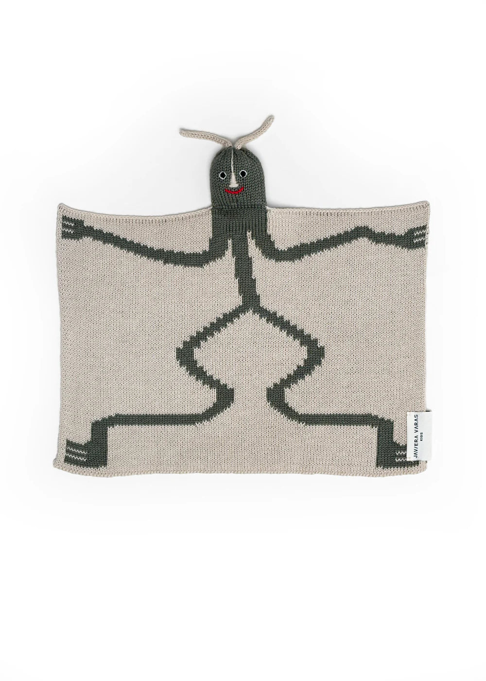 Knitted blanket with a bird lovey by Javiera Varas on a white background
