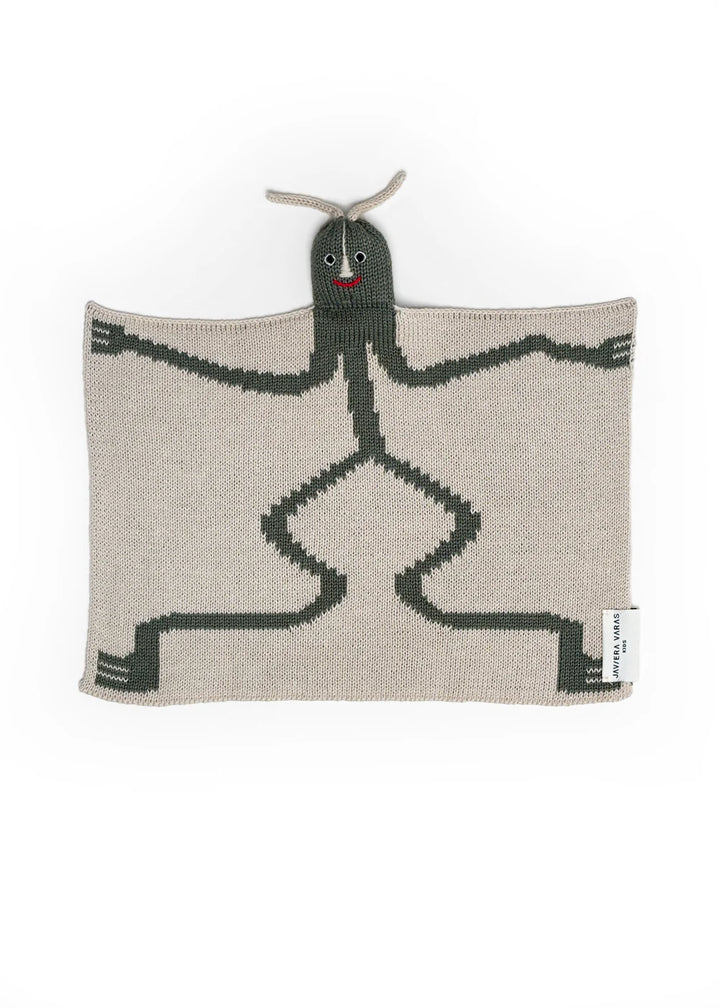 Knitted blanket with a bird lovey by Javiera Varas on a white background