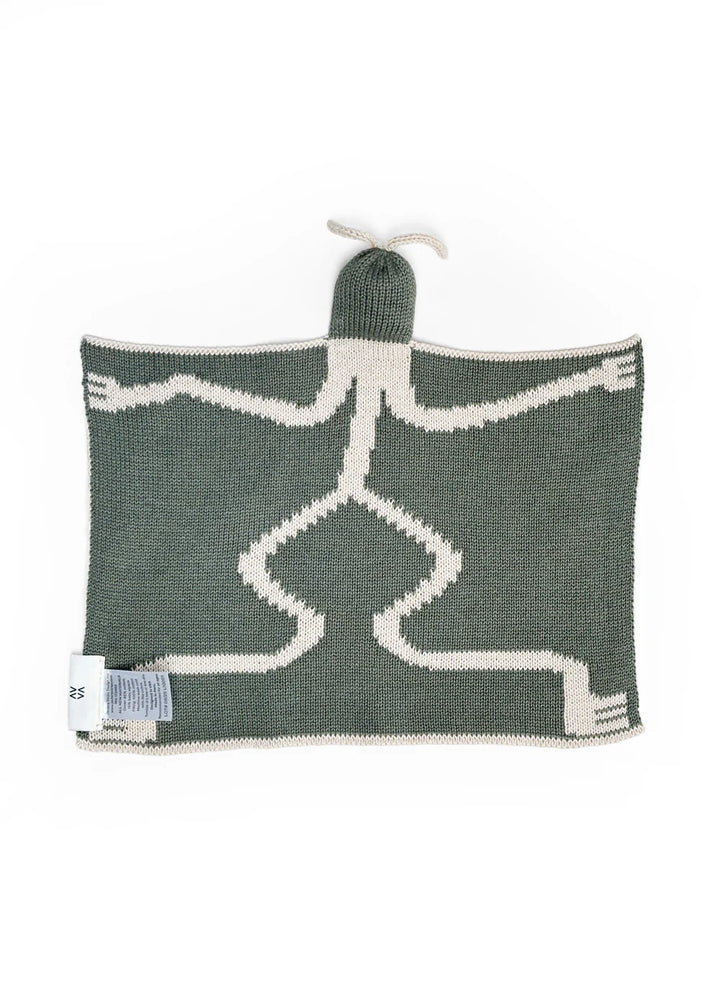 Knitted blanket with a bird lovey by Javiera Varas back