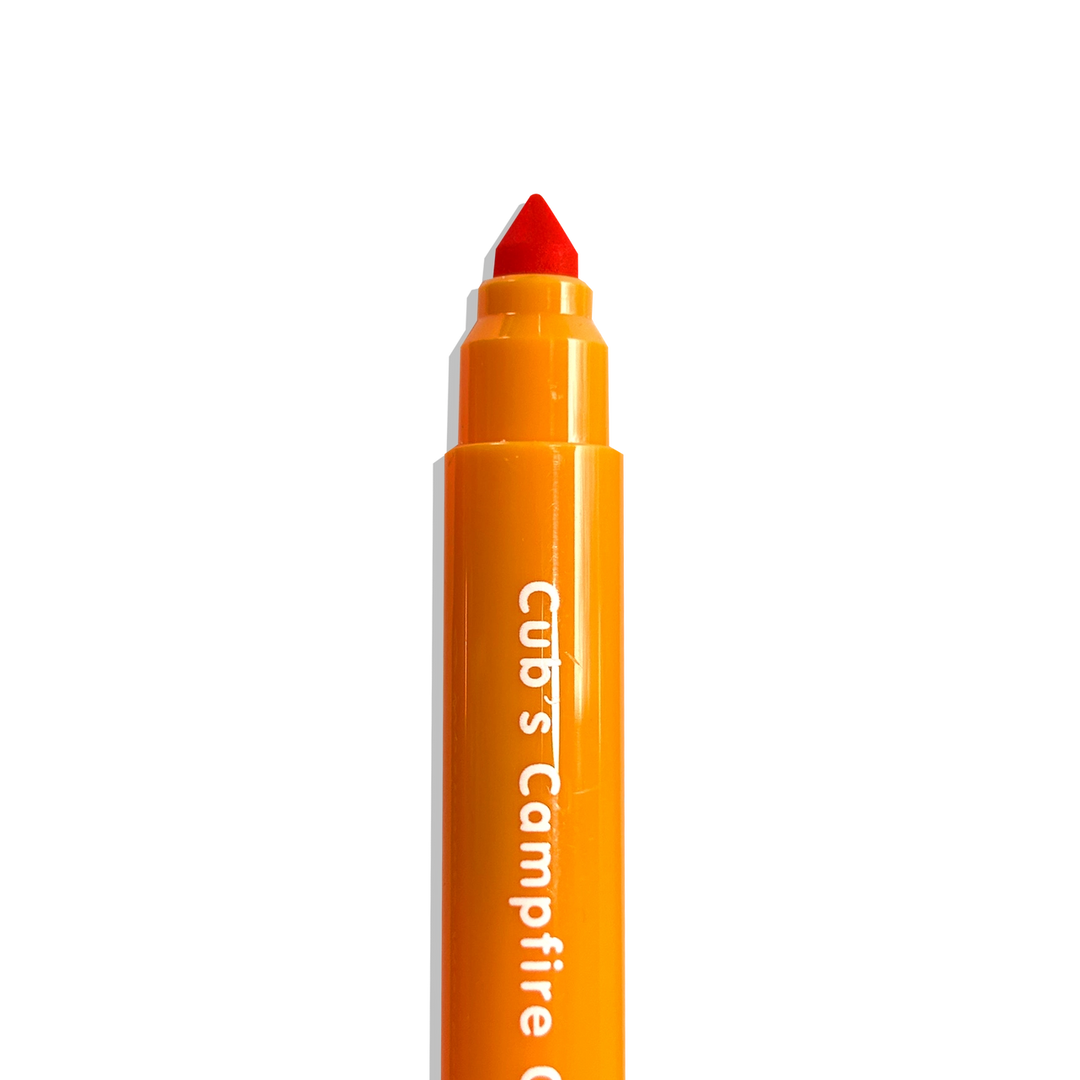 Orange marker with red cap on a white background