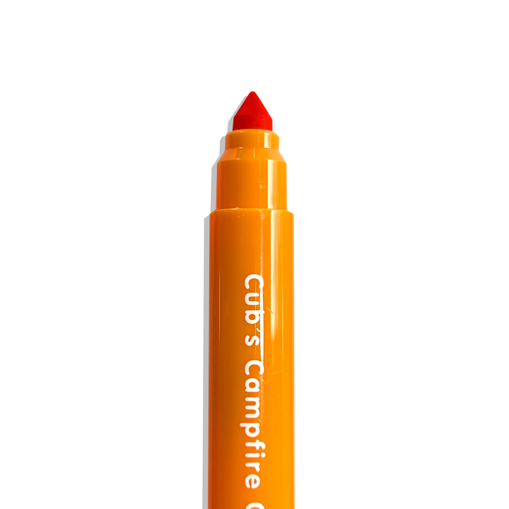 Orange marker with red cap on a white background