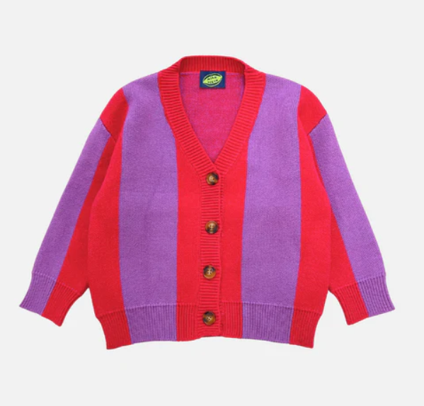 Children’s cardigan with bold pink & purple stripes, button-up front, and relaxed fit, laid flat to show knit texture and design