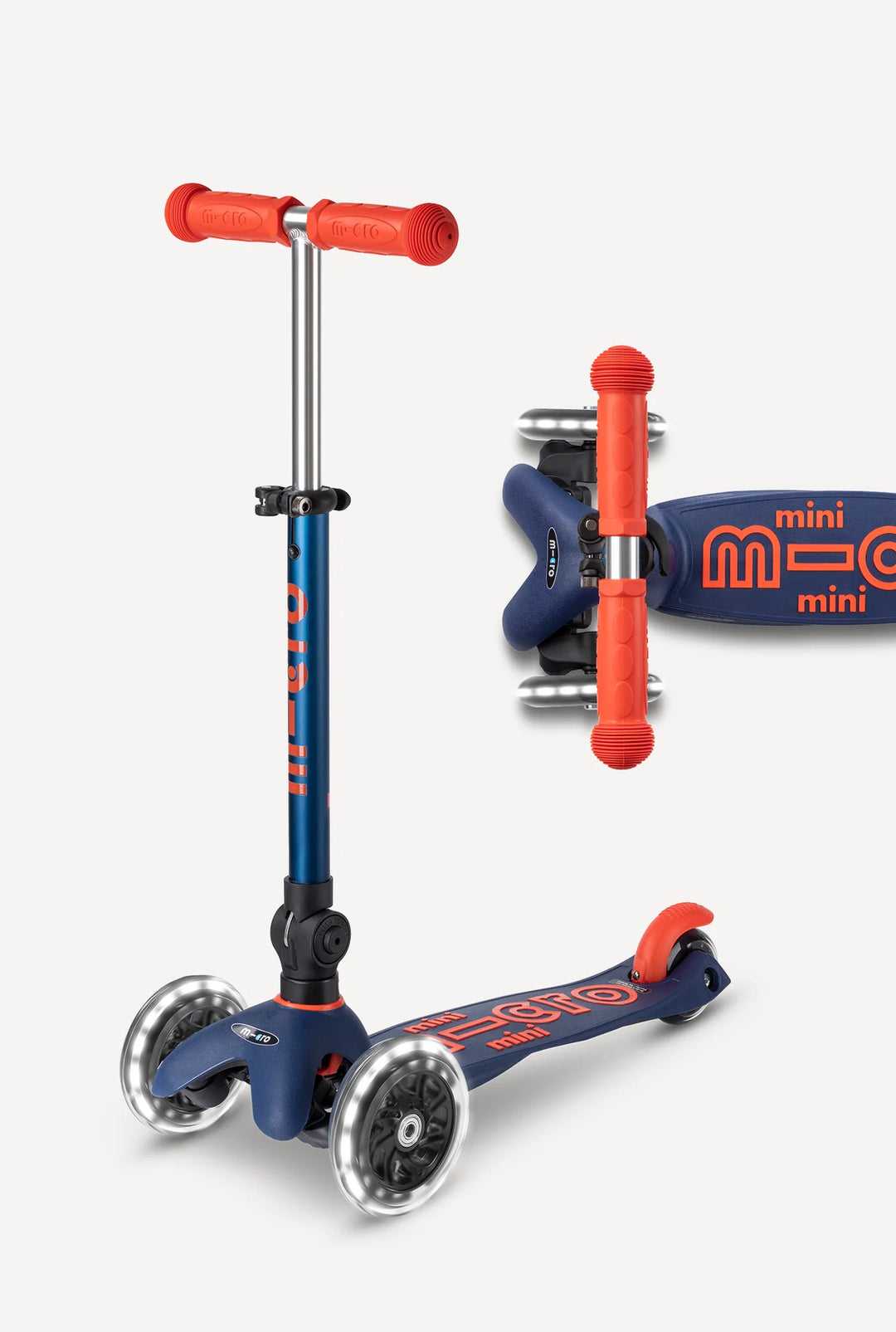Blue and orange scooter with red handlebars on a white background