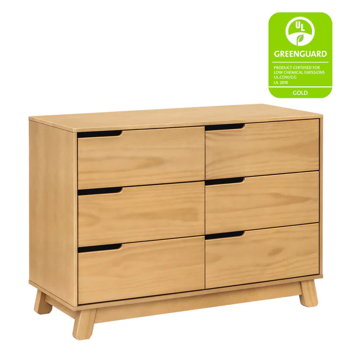 Wooden dresser with 6 drawers and Greenguard Gold certification label on a white background