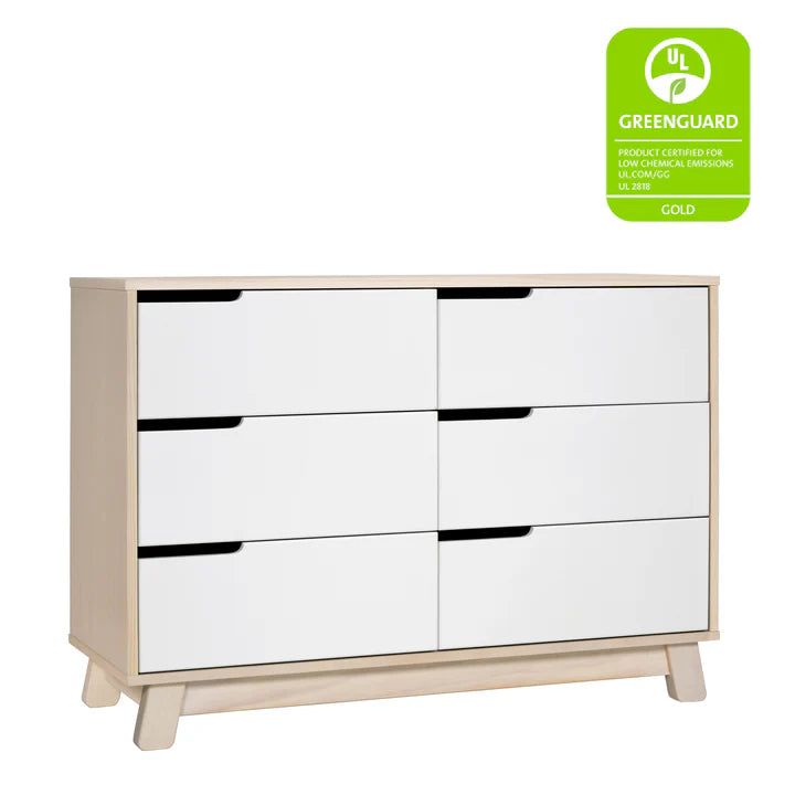 White dresser with beige legs and Greenguard Gold certification label on a white background