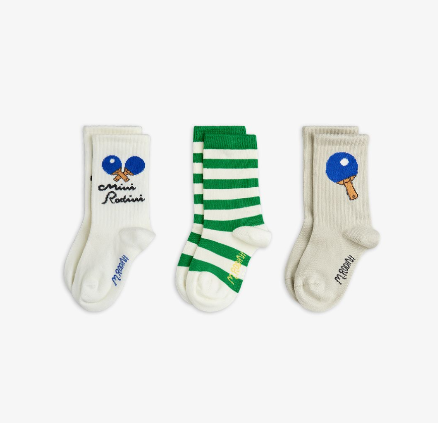 Three pairs of socks with different designs on a white background by Mini Rodini Table Tennis