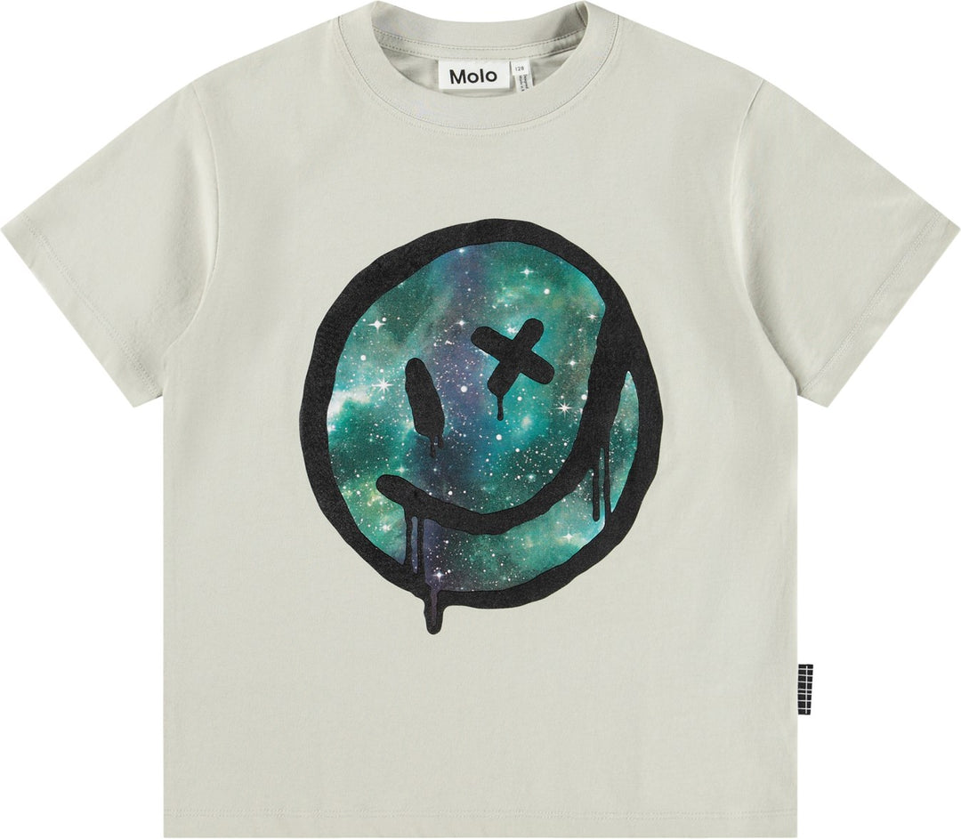 off white tshirt made of soft organic cotton with short sleeves and a ribbled neckline. The tshirt has a loose fit with a print on the front of a melting smiling face.&nbsp;