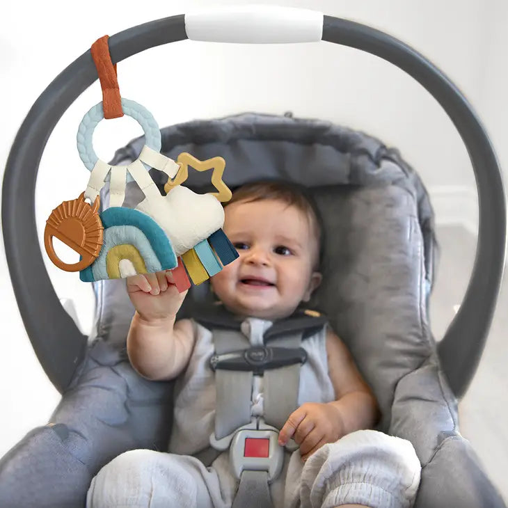Baby Playing With Cloud Bitzy Busy Ring by Itzy Ritzy