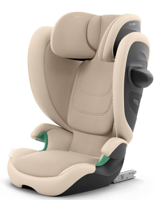 A high-back child car seat in beige and black with small green accents, shown on a clean white background. The brand name 'Cybex' is visible on the upper right side of the headrest.